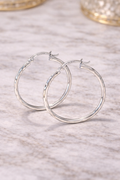 Diamond-Cut Silver Hoop Earrings