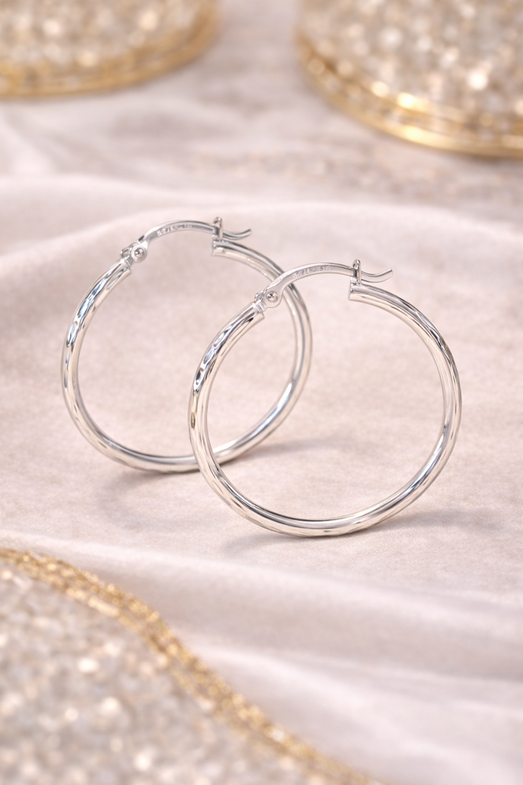 Diamond-Cut Silver Hoop Earrings